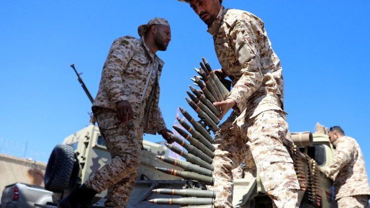 Forces loyal to the UN-backed government prepare to deploy to the front line in Tripoli