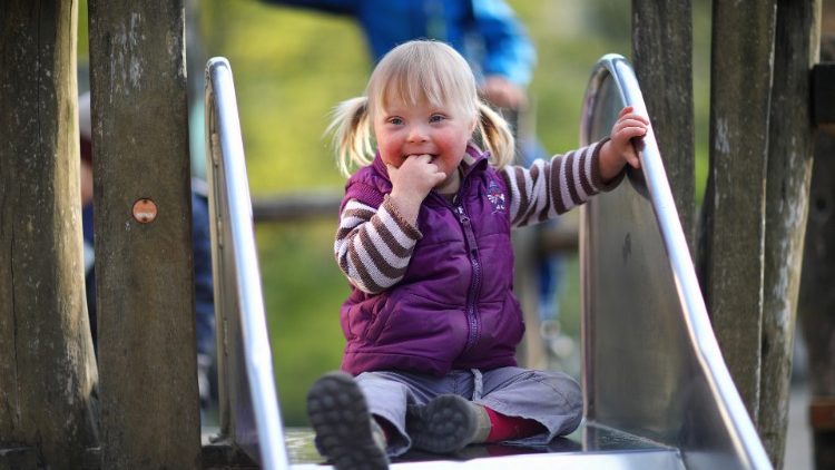 A girl, Judith, with Down syndrome is pictured at a playground in Berlin