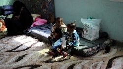 libyan-displaced-family-members-sit-at-bader--1555256952240.JPG