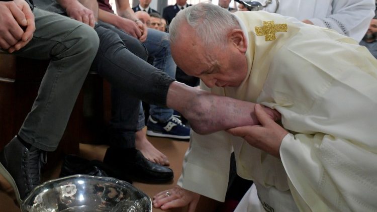 Pope Francis kisses a foot of an inmate during the celebrations of the Holy Thursday at the District House of Velletri prison, in Velletri near Rome