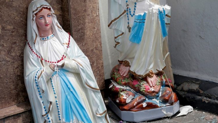A statue of the Virgin Mary broken in two at St. Anthony's Catholic Shrine in Kochchikade