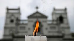 a-candle-burns-outside-st--anthony-s-shrine-a-1556432095934.JPG