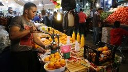 a-vendor-sells-an-orange-juice-for-customers--1557330842451.JPG