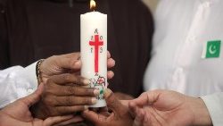 people-of-various-religions-hold-a-candle-for-1557393540644.JPG