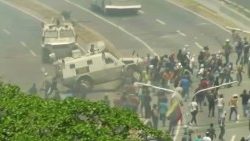 a-venezuelan-national-guard-vehicle-ploughs-i-1558076658363.JPG
