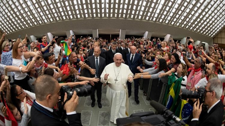 Pope Francis greets the faithful during an audience with members of the Catholic Charismatic Renewal International Service, at the Paul VI Hall at the Vatican