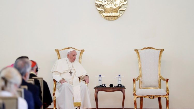 Pope Francis sits during a meeting with authorities, leaders of civil society and the diplomatic corps