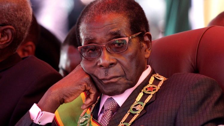FILE PHOTO:  Zimbabwe's President Mugabe looks on during a rally marking Zimbabwe's 32nd independence anniversary celebrations in Harare