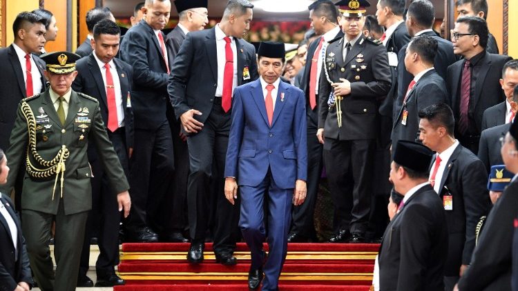Indonesian President Joko Widodo (centre) after his swearing-in ceremony on October 20, 2019. 