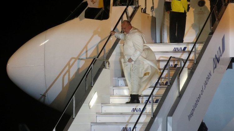Pope Francis disembarks from the papal plane in Tokyo