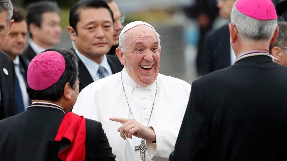 Pope Francis laughs with Japanese Bishops