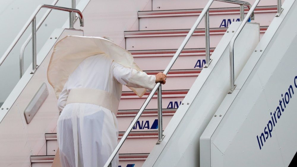 Pope Francis boards the papal plane in Tokyo