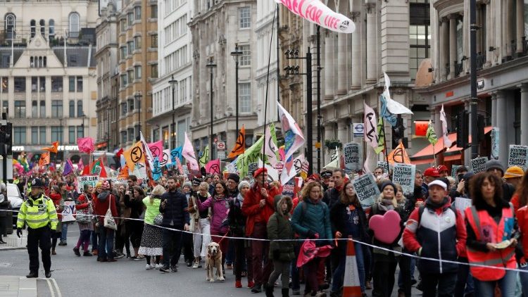 Demonstrators from Extinction Rebellion and Parents 4 Future march in a joint protest over climate change, in London