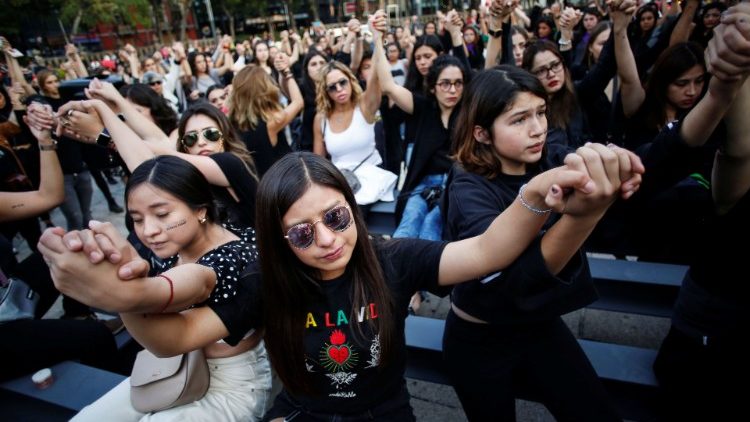 Women protest against gender violence and femicides at Angel de la Independencia monument in Mexico City