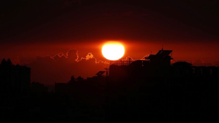The sun sets as violence flares up between Palestinian militants and Israeli forces over the Gaza border, in Gaza City