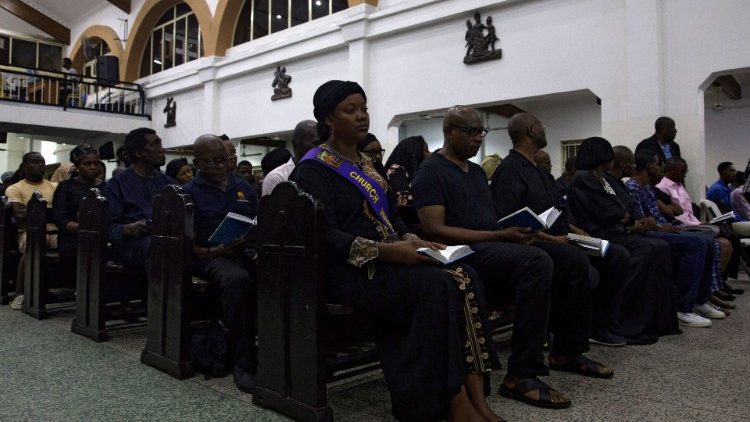 People attend Ash Wednesday Mass inside the Church of the Assumption in Ikoyi district, Nigeria