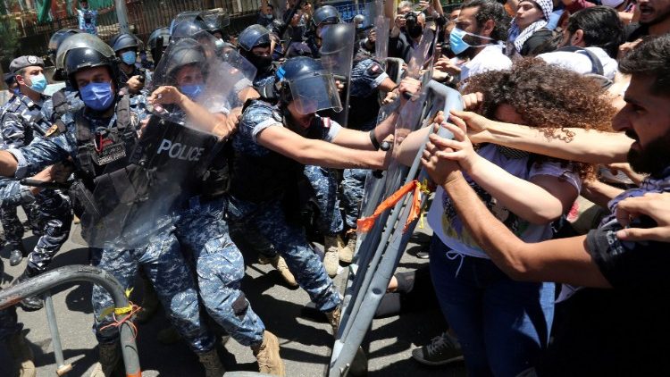 Protesters confront with riot police in Beirut