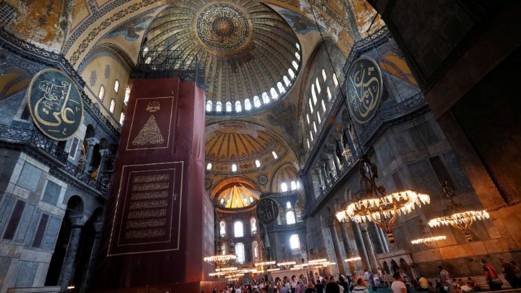 People visit Hagia Sophia Grand Mosque on the eve of the Muslim festival of Eid al-Adha, in Istanbul