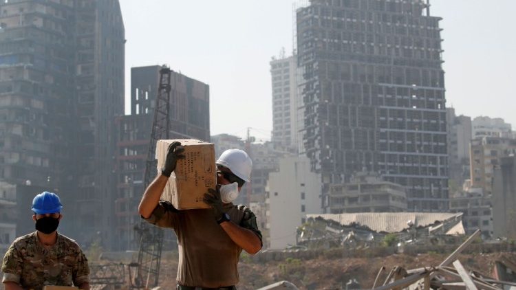 FILE PHOTO: A member of the French military works at the damaged site of the massive blast in Beirut's port area, in Beirut