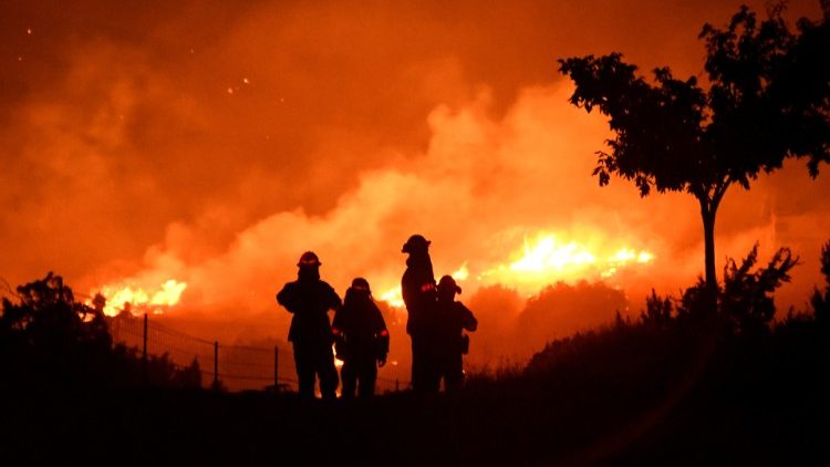 Wildfire in California burns through the night north of Los Angeles