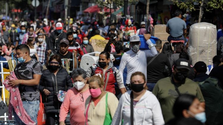 Shoppers amass in a popular street in Mexico City