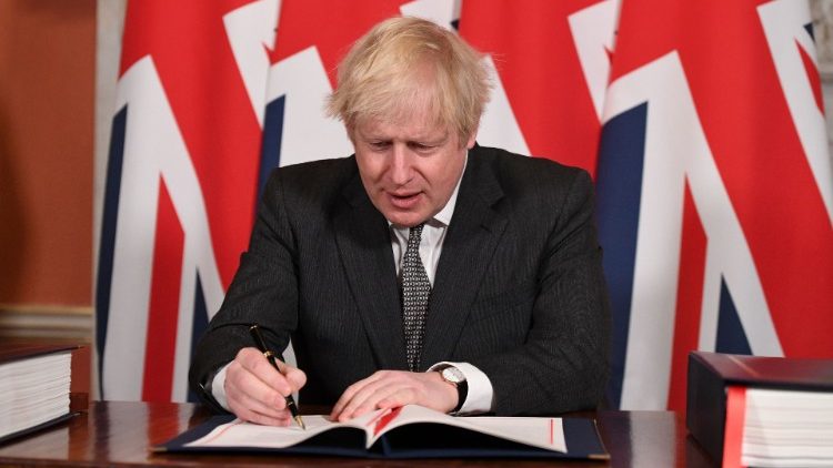 Premier Wielkiej Brytanii Boris Johnson podpisuje Brexit