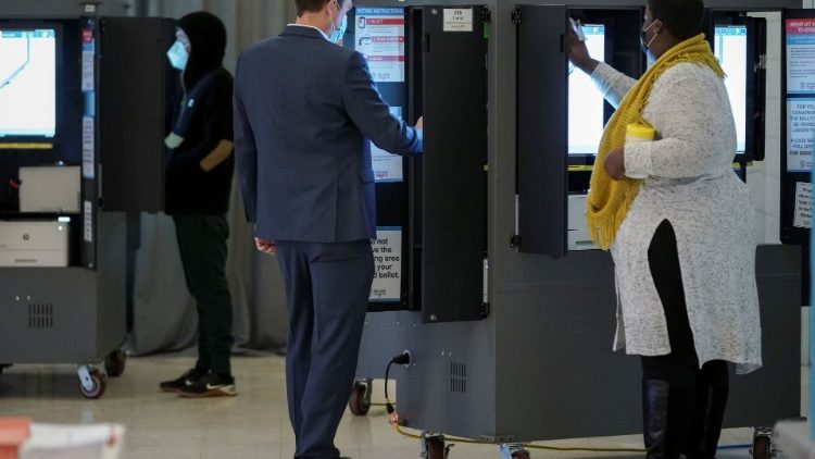 Voters cast their ballots in Georgia’s Senate runoff elections