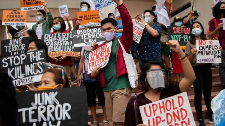 Protesters march at the University of the Philippines