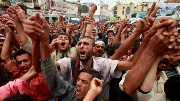 FILE PHOTO: Anti-government protesters attend a rally in 2011 in Sanaa