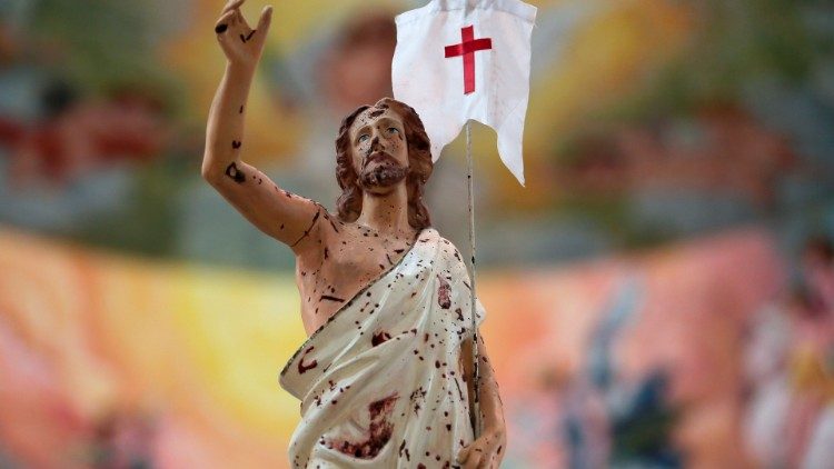 A statue of the Risen Christ, splattered with blood from a bomb attack in Sri Lanka in 2019