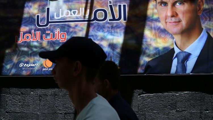 Plakat mit Abbildung von Präsident Bashar al-Assad in Damaskus