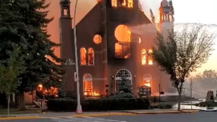 Flames engulf a Catholic church in Canada