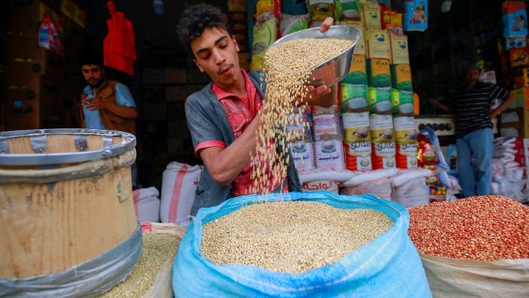 A spices vendor displays grains at his shop in Sanaa