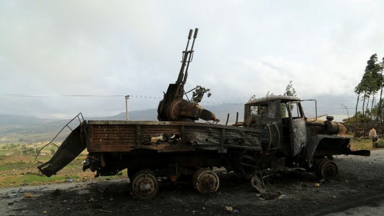 A burnt truck with a machine gun mounted on it, the grim aftermath of the conflict in the Tigray region