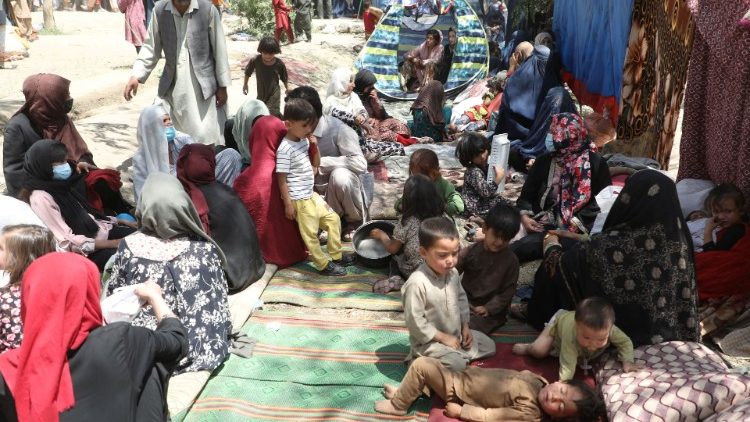 Displaced Afghans take shelter in a public park in Kabul.