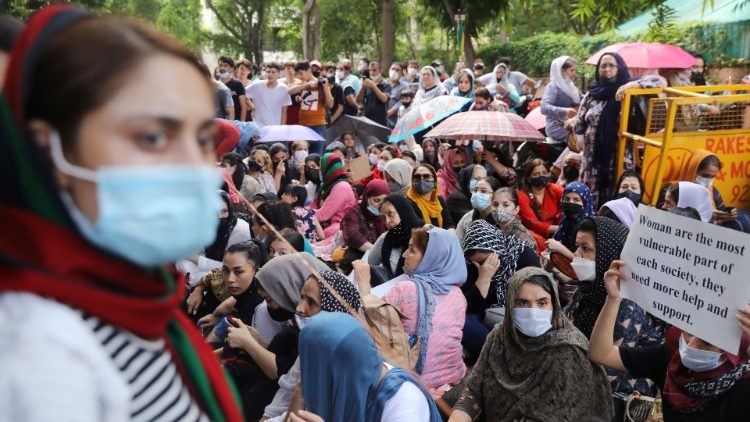 Manifestation de réfugiées afghanes devant un bureau du HCR à New Delhi, en Inde, le 23 août 2021.