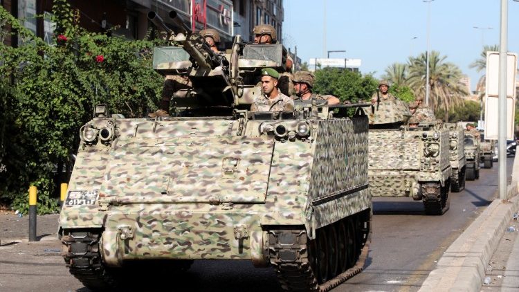 Lebanese army soldiers patrol the street in Beirut