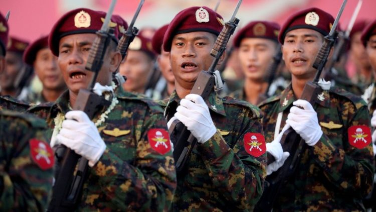 Myanmar soldiers take part in a military parade in the capital, Naypyitaw