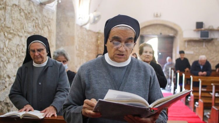 Maronite Catholic nuns attend a liturgy