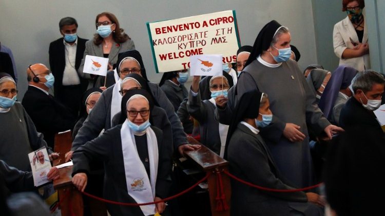 Nuns wait for Pope Francis to arrive at the Maronite Cathedral of Our Lady of Graces in Nicosia