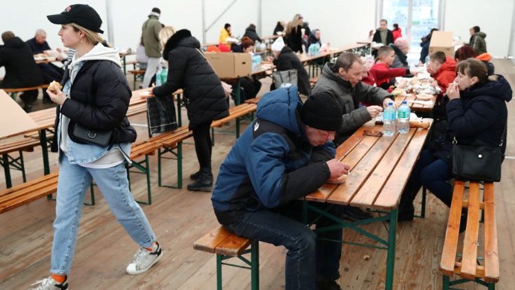 A general view shows a food tent set up by Caritas for people fleeing Ukraine, amid Russia's invasion, in Krakow