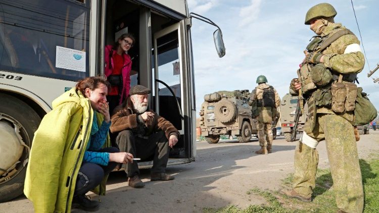 Evacuees from the Mariupol steel plant arrive at a temporary accommodation centre in Bezimenne