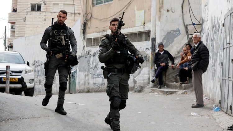 Israeli police officers patrol an area in East Jerusalem