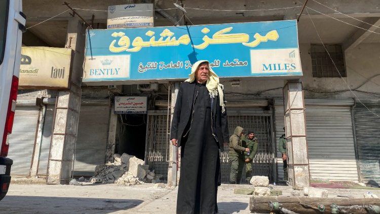 A resident of Aleppo evacuated from a building for safety