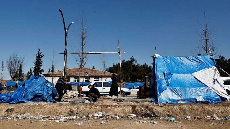 Displaced Syrians set up tent at a temporary accommodation centre in Gaziantep