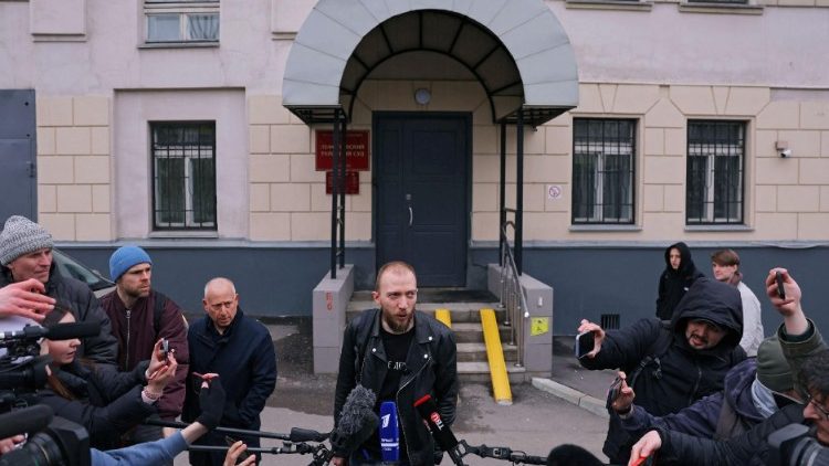Daniil Berman, a lawyer of the Wall Street Journal reporter Evan Gershkovich, detained on suspicion of espionage, speaks to the journalists outside a court building in Moscow