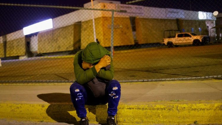 A migrant from Venezuela mourns his brother outside the immigration detention center where 39 men died after a fire broke out