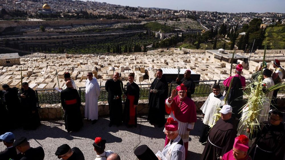 Latin Patriarch of Jerusalem Pierbattista Pizzaballa leads a Palm Sunday procession on the Mount of Olives in Jerusalem