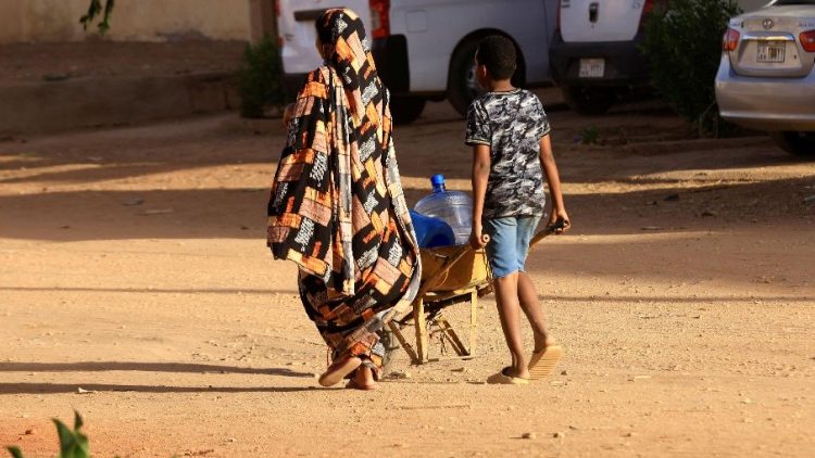People looking for water in Khartoum North