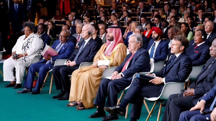 World leaders listen to opening speeches at the New Global Financial Pact Summit in Paris
